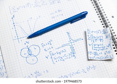 Math handwriting in notebook closeup