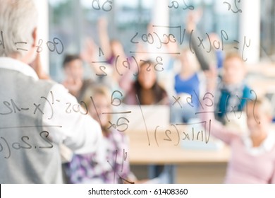 Math Lesson At High School - Students With Professor In Classroom