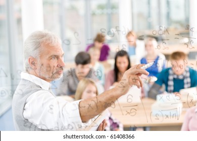 Math Lesson At High School - Students With Professor In Classroom