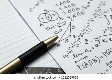 Math problems on graph paper with pencil ,formula arithmetic using for concept of World Maths Day.
