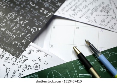 Math problems on graph paper with pencil ,formula arithmetic using for concept of World Maths Day.
