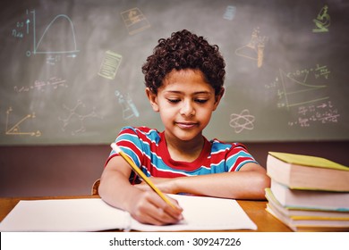 Math And Science Doodles Against Little Boy Writing Book In Classroom