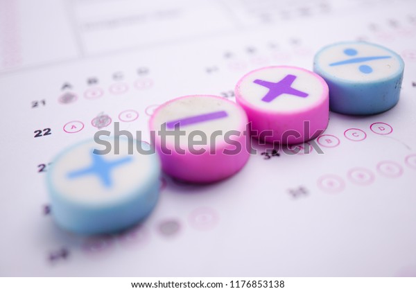 Math Symbols on answer sheet background.\
Education concept.