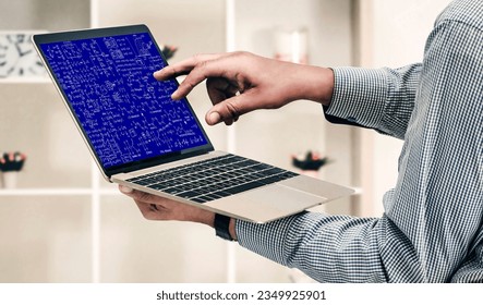 Mathematic equations and modish formula on computer screen showing concept of science and education