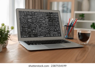 Mathematic equations and modish formula on computer screen showing concept of science and education