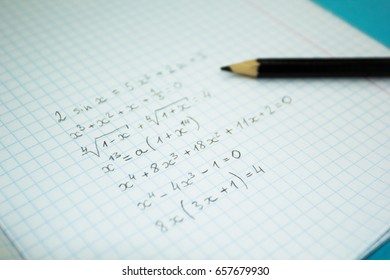 Mathematical examples and calculations in a notebook for lectures.