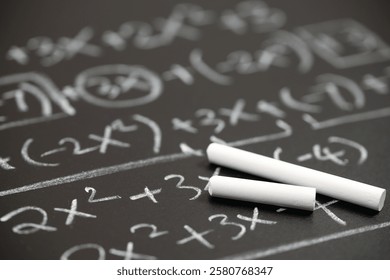 Mathematical operations and algebra mathematic formula written with chalk on the blackboard
