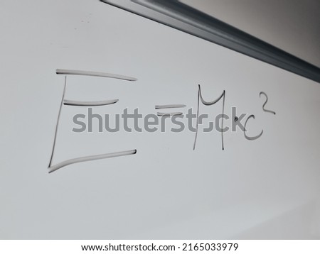 mathematical symbols of an equation from a mathematics lecture on a white board