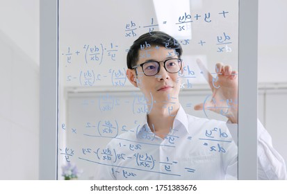 mathematicians concept. Handsome man thinking on white background, graphic image idea, man mathematicians are calculating with glass board in a financial company  - Powered by Shutterstock - Get 15% off with code: PIKWIZARD15