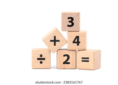 Mathematics basic proposition, numbers and operation signs in wood cubes isolated on white background