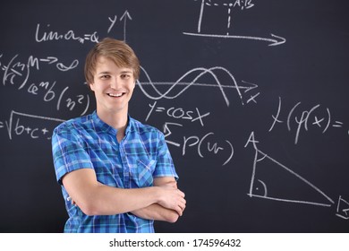 Mathematics, Physics, Chemistry-student At The Blackboard . Portrait Of A Student At The Blackboard Background With Patterns