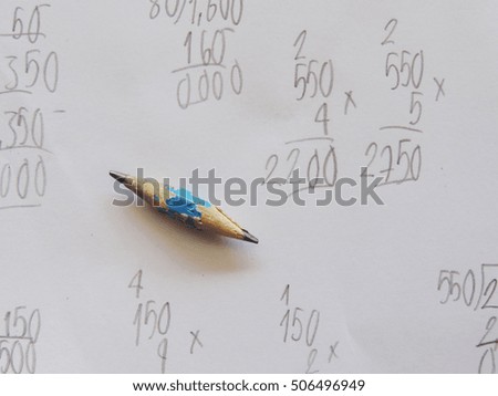 maths calculation with pencil.          