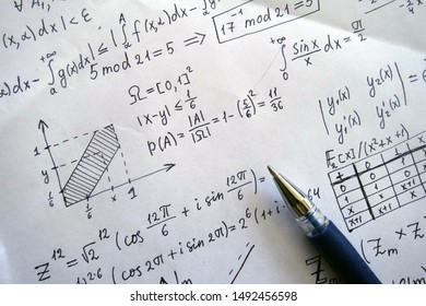 Maths concept - pen over a sheet of paper with maths-formulas. Complex analysis, 
abstract algebra. Probability theory, meeting probability.
 - Shutterstock ID 1492456598