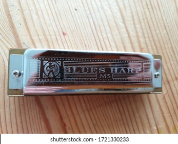 MATLOCK, UNITED KINGDOM, 2nd May, 2020: A Hohner Harmonica Or Blues Harp In The Key E.