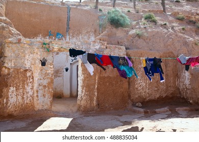 MATMATA, TUNISIA, AFRICA-CIRCA MAY, 2012: Entrance in the room from yard of an underground cave house. Cave-dwellers Berbers living.