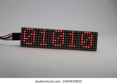 Matrix display board made from red dot LED showing some numbers. Binary numbers are shown on an matrix display