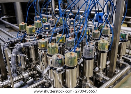 Matrix of mixproof separation valves in modern food or chemical factory.