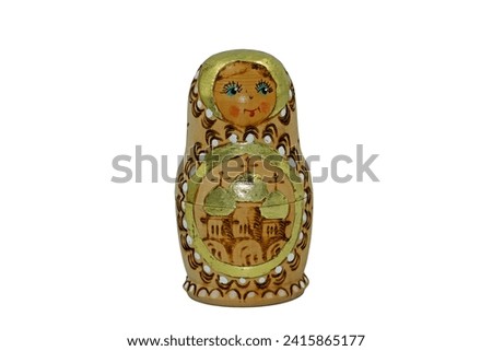 A matryoshka doll isolated on white. It is a famous Russian national souvenir, consists of  a setof red nesting wooden dolls of different sizes