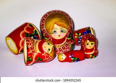 Matryoshka Doll Set Isolated On A White Background. Traditional Russian Nesting Dolls. Stacking Dolls (babushka) Half Open. Selective Focus.