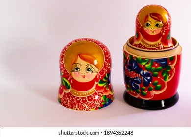 Matryoshka Doll Set Isolated On A White Background. Traditional Russian Nesting Dolls. Stacking Dolls (babushka) Half Open. Selective Focus.