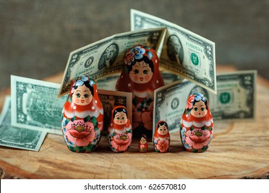 Matryoshka. Russian Doll With Dollars. Anti Crisis Money Box. Matrioska Bank.