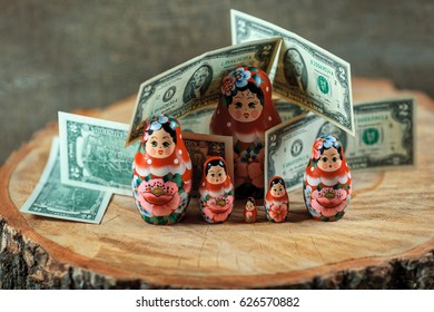 Matryoshka. Russian Doll With Dollars. Anti Crisis Money Box. Matrioska Bank.