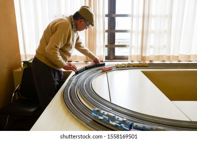 Matsudo, Chiba / Japan - November 3, 2019: An Old Man Holding Model Train On Track In The Cultural Day Exhibition That Held At Matsudo Kogane Citizen Center