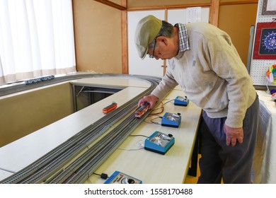 Matsudo, Chiba / Japan - November 3, 2019: An Old Man Holding Model Train On Track In The Cultural Day Exhibition That Held At Matsudo Kogane Citizen Center