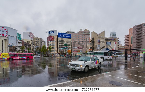 MATSUMOTO,JAPAN-APRIL\
18,2018 : Downtown Street View at JR Matsumoto Train Station in\
rainy day,Nagano\
Prefecture,Japan.