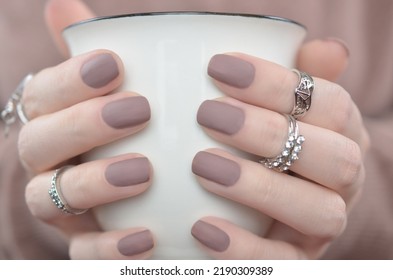 Matte nails with beige manicure. - Shutterstock ID 2190309389