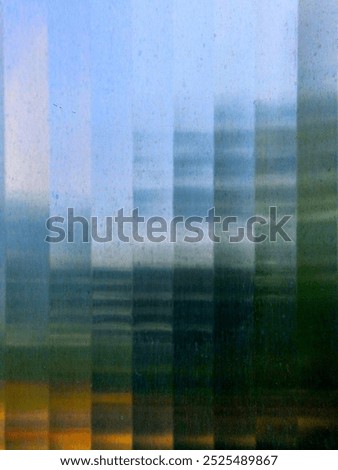 the matte sheet is bent into a striped texture. cladding made of stainless steel plates on the facade of the house. refracts light and reflections