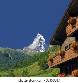 Matterhorn And Swiss Chalet