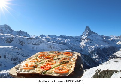 The Matterhorn In Zermatt, Switzerland. Ski Food At A Mountain Restaurant. Zermatt Ski. Flammkuchen.