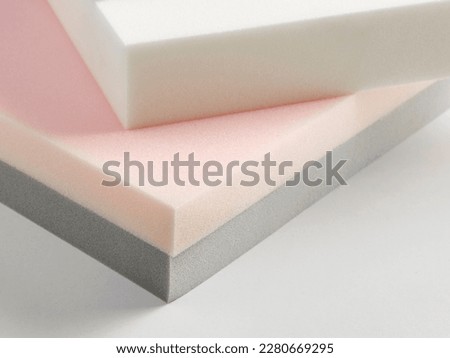Mattress bed sponge section on the isolated white background.