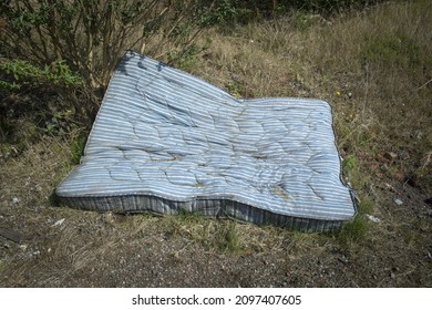 Mattress Dumped On Brownfield Land, Site Of Former Heavy Industry 