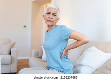 Matur Woman suffering from lower back pain. Mature woman resting with back pain. Female lower back pain. Senior woman injury suffering from backache, Spine in 3d