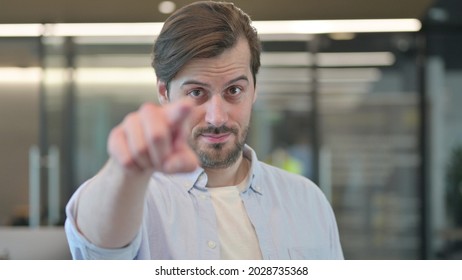 Mature Adult Man Pointing At Camera