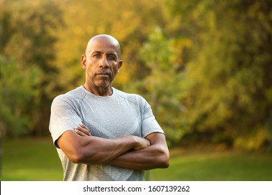 Mature African American man not smiling.