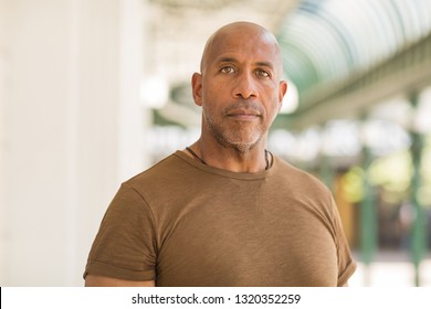 Mature African American Man Wearing Glasses.