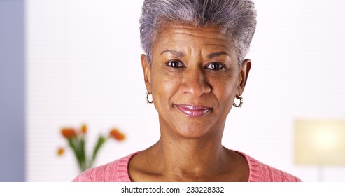 Mature African woman smiling at camera