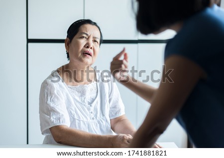 Mature asian woman with alzheimer's disease,Elderly women forgot remember faces and name,Dementia