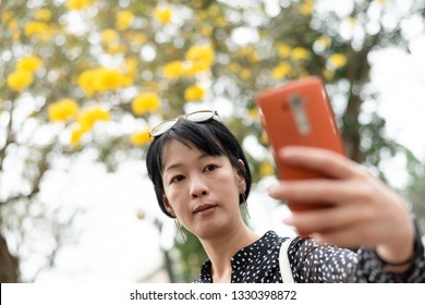 Mature Asian Woman Selfie In The Outside