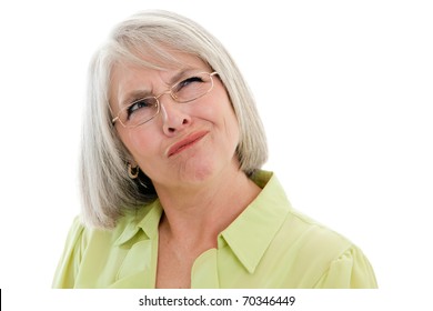 Mature, attractive Caucasian woman making a confused face