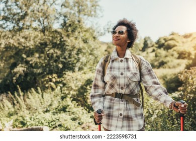 Mature Black Woman Hiking Alone On Mountain In A Beautiful Sunny Autumn Day.