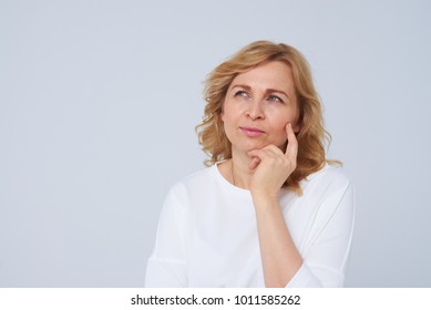 Mature Blond Woman Thinking About Something