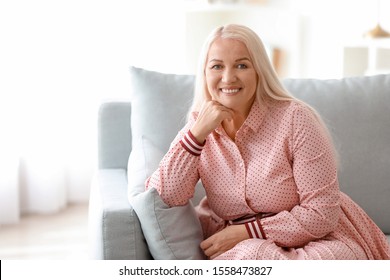 Mature body positive woman at home