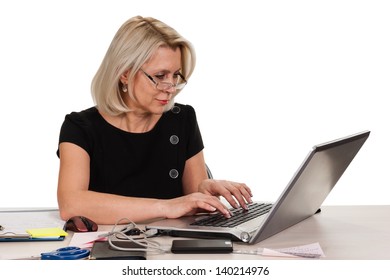 Mature Business Woman Working In The Office Isolated On White Background