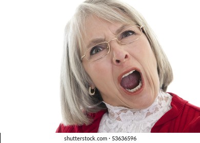 Mature Caucasian woman yelling with an angry expression