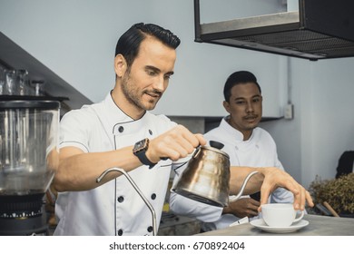 Mature Chef In Kitchen Cooking Dish For Dinner, 30-40 Year Old, Vintage Tone.