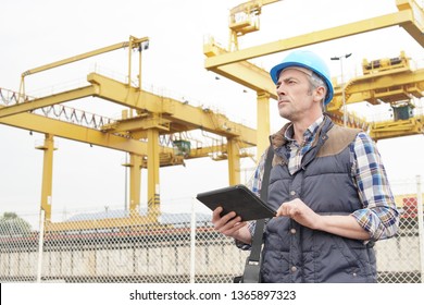 Mature Construction Worker Inspecting Work Sight